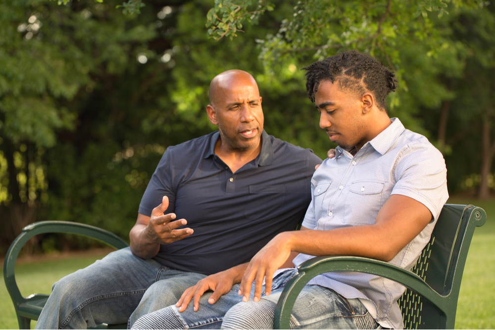 Man and son talk about family roles in addiction treatment