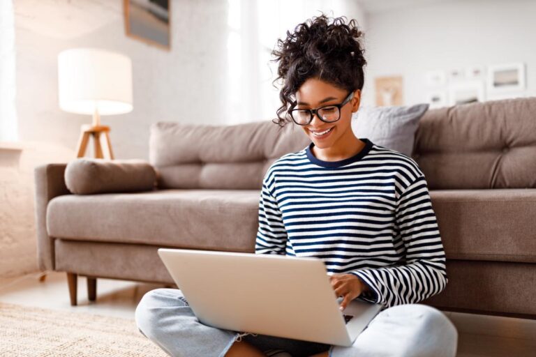 a woman uses her computer to research how does a virtual iop work