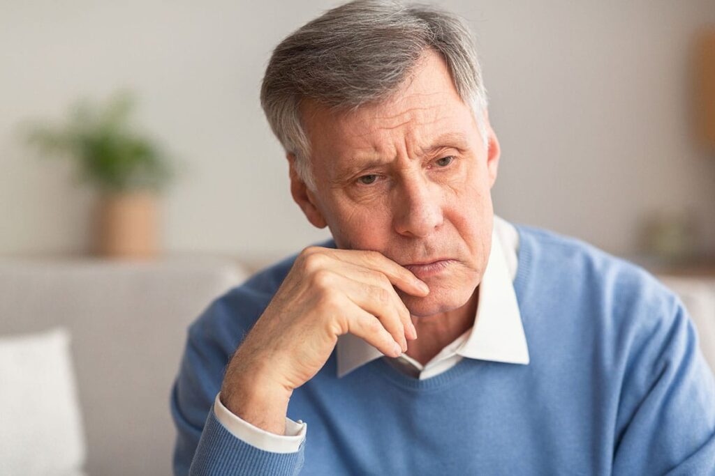 Man thinking about the question, "Do alcoholics get worse with age?"