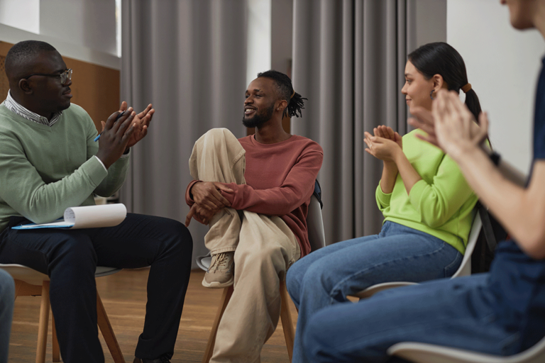 People experiencing the benefits of an aftercare program in recovery