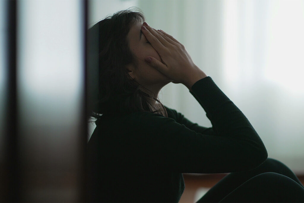 Woman struggling with substance abuse and trauma