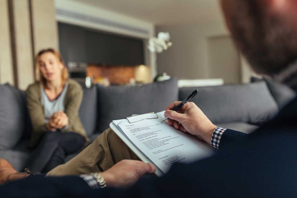 a client and therapist in a session of dialectical behavior therapy for addiction