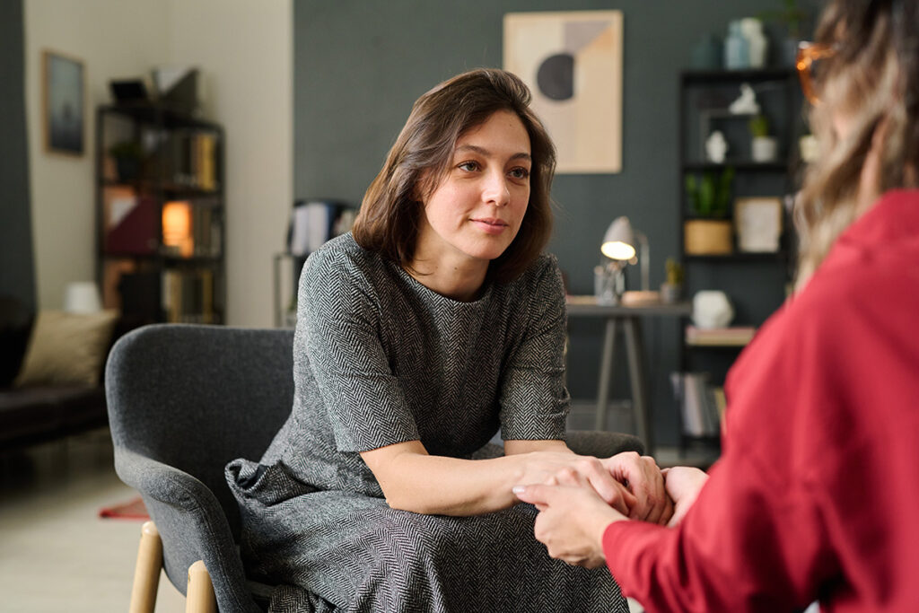 Two people talking about Mental Health Awareness Month